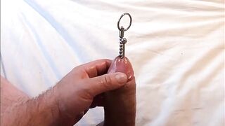 Extreme urethral sounding + cum. Hard oiled cock. After cum I push with every drop back in cock with a sound.