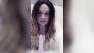 Crossdresser struggles with dildo