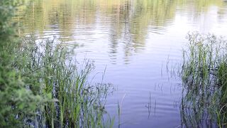 Swimming in lake in clothes. Black Wet skirt, wet stockings and tank top. Wetlook transgirl in lake.