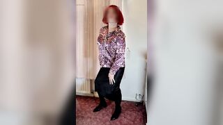 Crossdresser in satin blouse and skirt