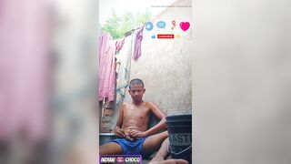 Indian boy bathing nude in public bathroom