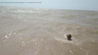 Swimming, splashing and posing naked in the sea...