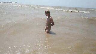 Swimming, splashing and posing naked in the sea...