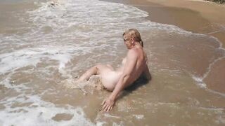 Swimming, splashing and posing naked in the sea...