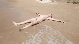 Swimming, splashing and posing naked in the sea...