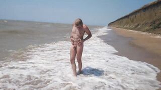 Swimming, splashing and posing naked in the sea...