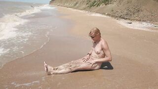 Swimming, splashing and posing naked in the sea...