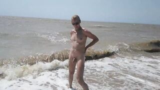 Swimming, splashing and posing naked in the sea...