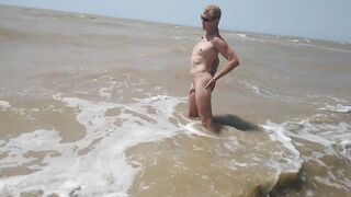 Swimming, splashing and posing naked in the sea...