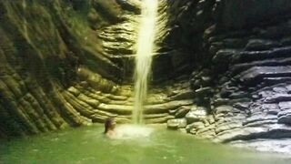 Alexa Cosmic transgirl swimming at waterfall in shirt and t-shirt... 1st waterfall