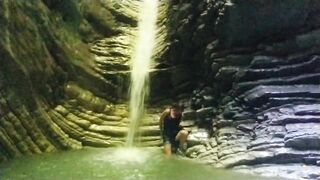 Alexa Cosmic transgirl swimming at waterfall in shirt and t-shirt... 1st waterfall