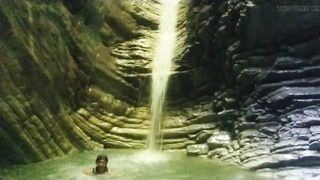 Alexa Cosmic transgirl swimming at waterfall in shirt and t-shirt... 1st waterfall