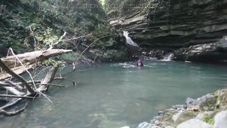 Alexa Cosmic transgirl swimming at waterfall in shirt and t-shirt...