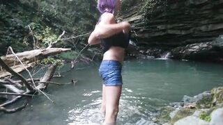 Alexa Cosmic transgirl swimming at waterfall in shirt and t-shirt...