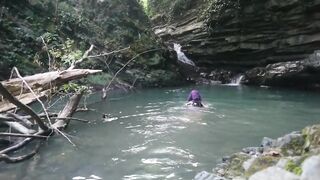 Alexa Cosmic transgirl swimming at waterfall in shirt and t-shirt...