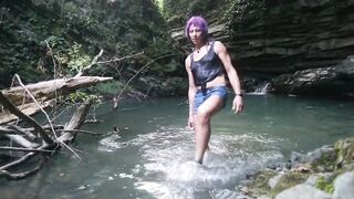 Alexa Cosmic transgirl swimming at waterfall in shirt and t-shirt...