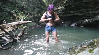 Alexa Cosmic transgirl swimming at waterfall in shirt and t-shirt...