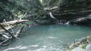 Alexa Cosmic transgirl swimming at waterfall in shirt and t-shirt...