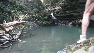 Alexa Cosmic transgirl swimming at waterfall in shirt and t-shirt...