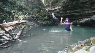 Alexa Cosmic transgirl swimming at waterfall in shirt and t-shirt...