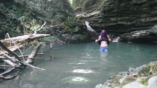 Alexa Cosmic transgirl swimming at waterfall in shirt and t-shirt...