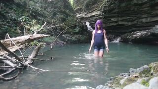 Alexa Cosmic transgirl swimming at waterfall in shirt and t-shirt...