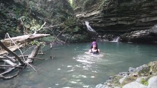 Alexa Cosmic transgirl swimming at waterfall in shirt and t-shirt...