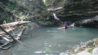 Alexa Cosmic transgirl swimming at waterfall in shirt and t-shirt...