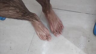 Dirty feet under water