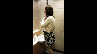 Beautiful crossdresser jerked off in a rest room