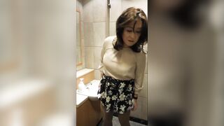 Beautiful crossdresser jerked off in a rest room